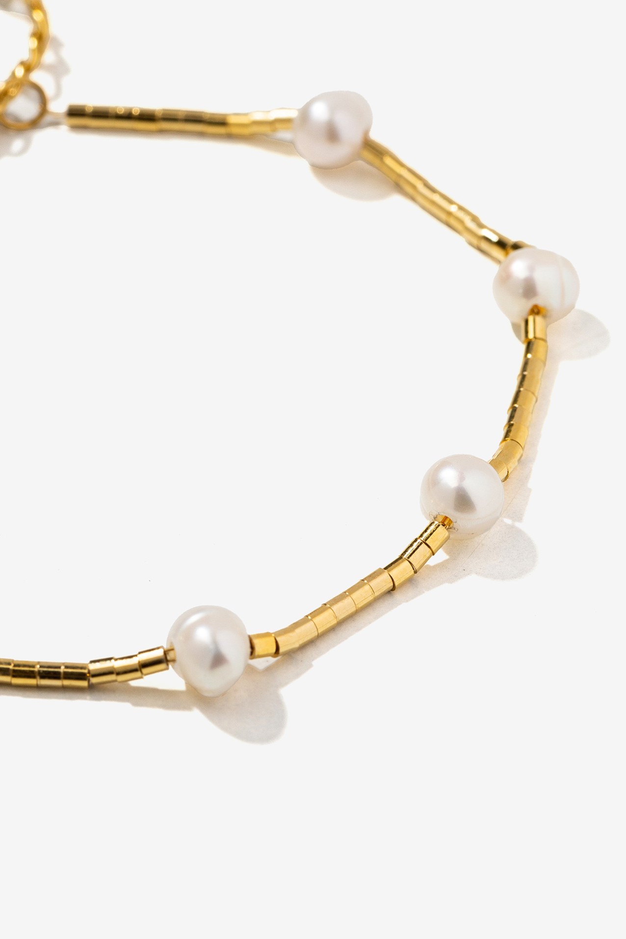 Pulseira de Ao com Prolas