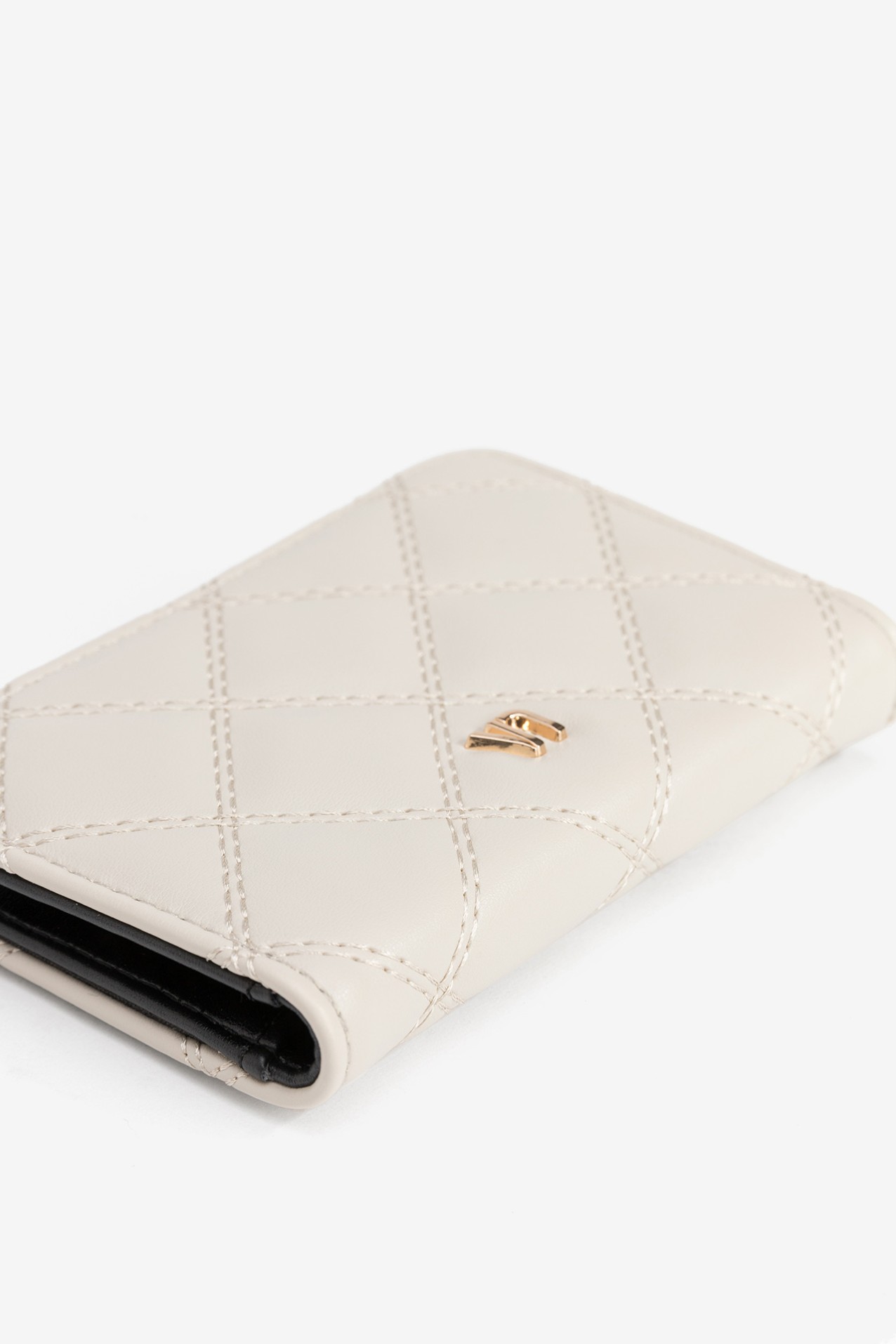 Porta-moedas bege acolchoado