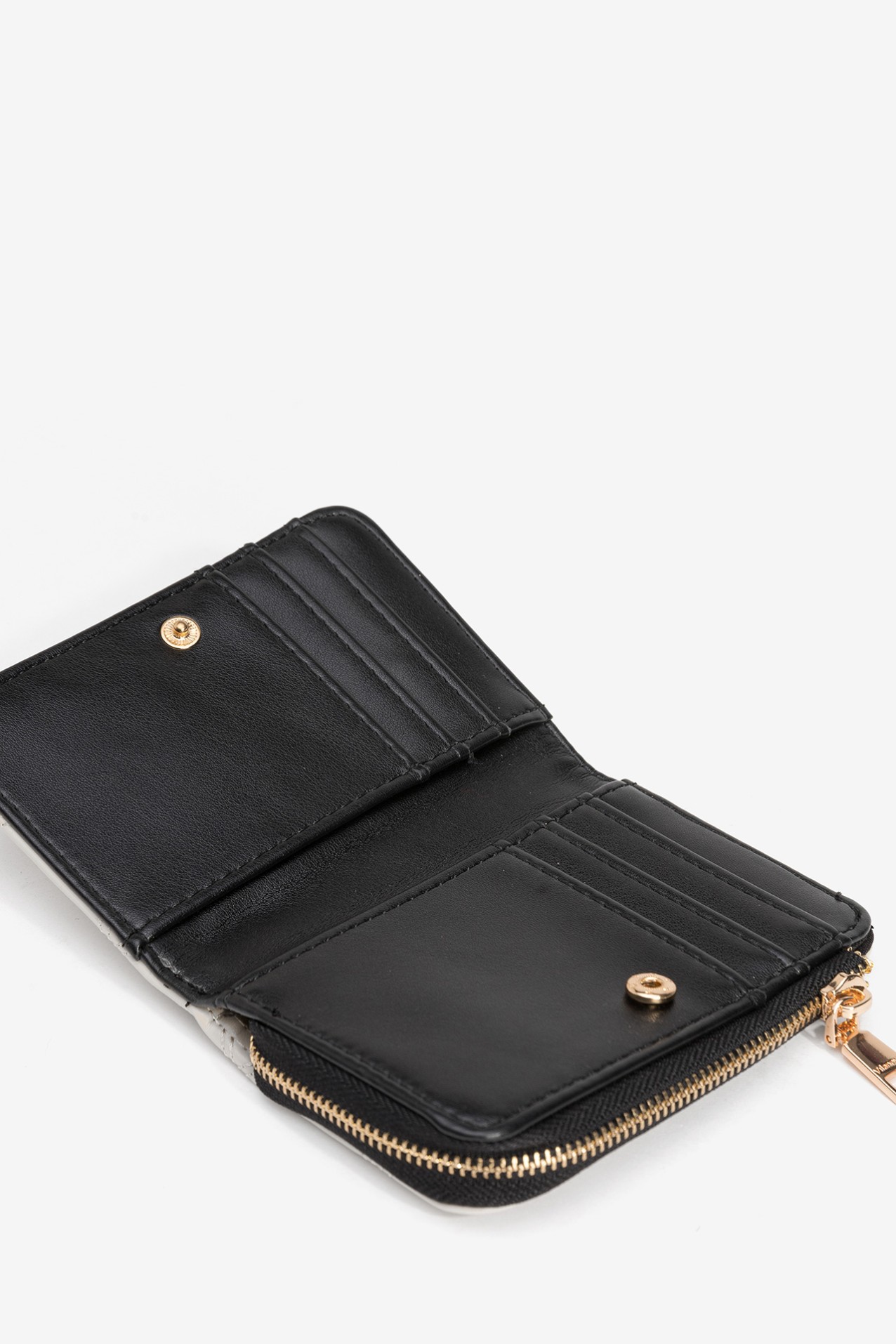 Porta-moedas bege acolchoado