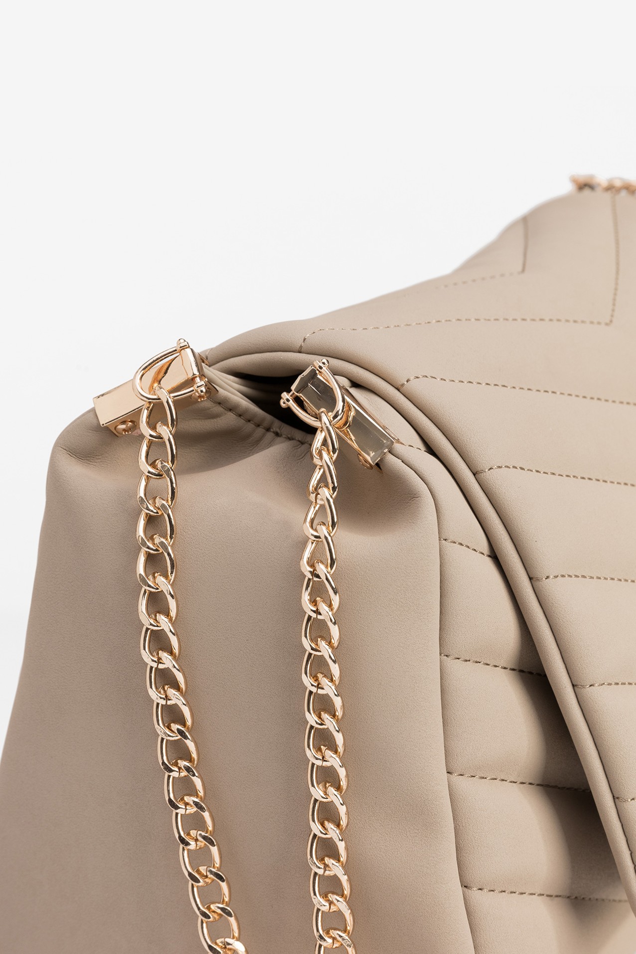 Bolso beige acolchado