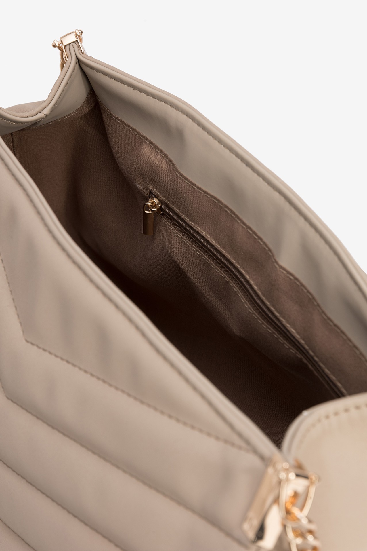 Bolso beige acolchado