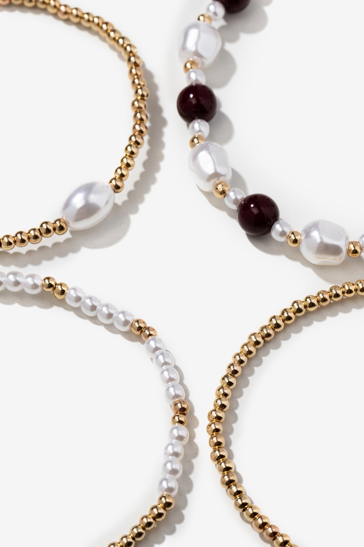 Pulseiras Douradas e Prolas