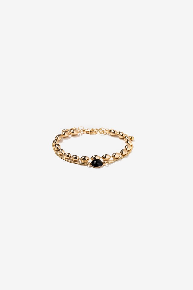Gold Bracelet with Black Stone