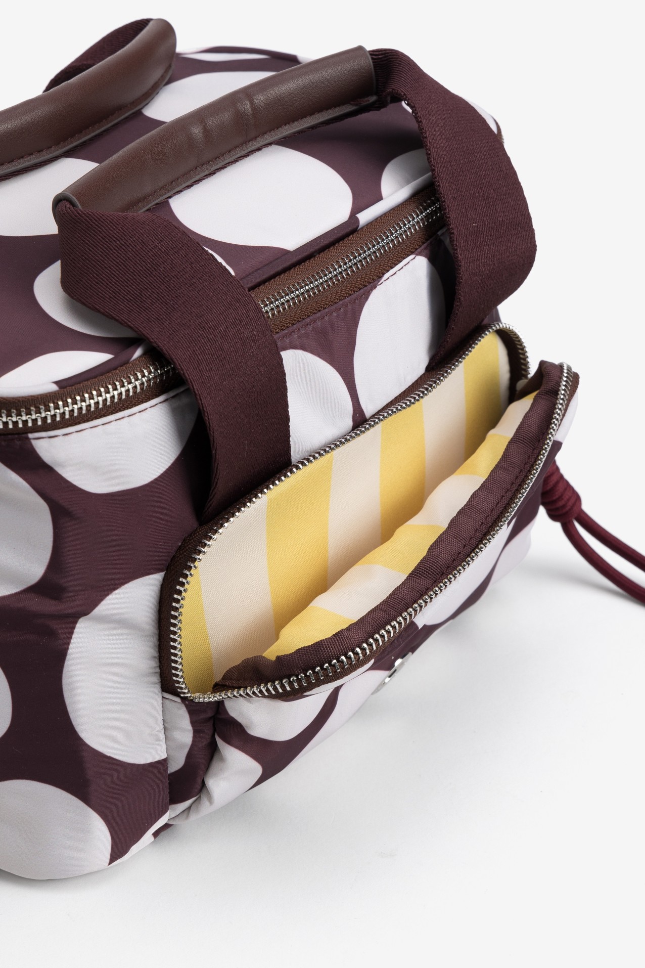 Nylon lunchbox with polka dot print.