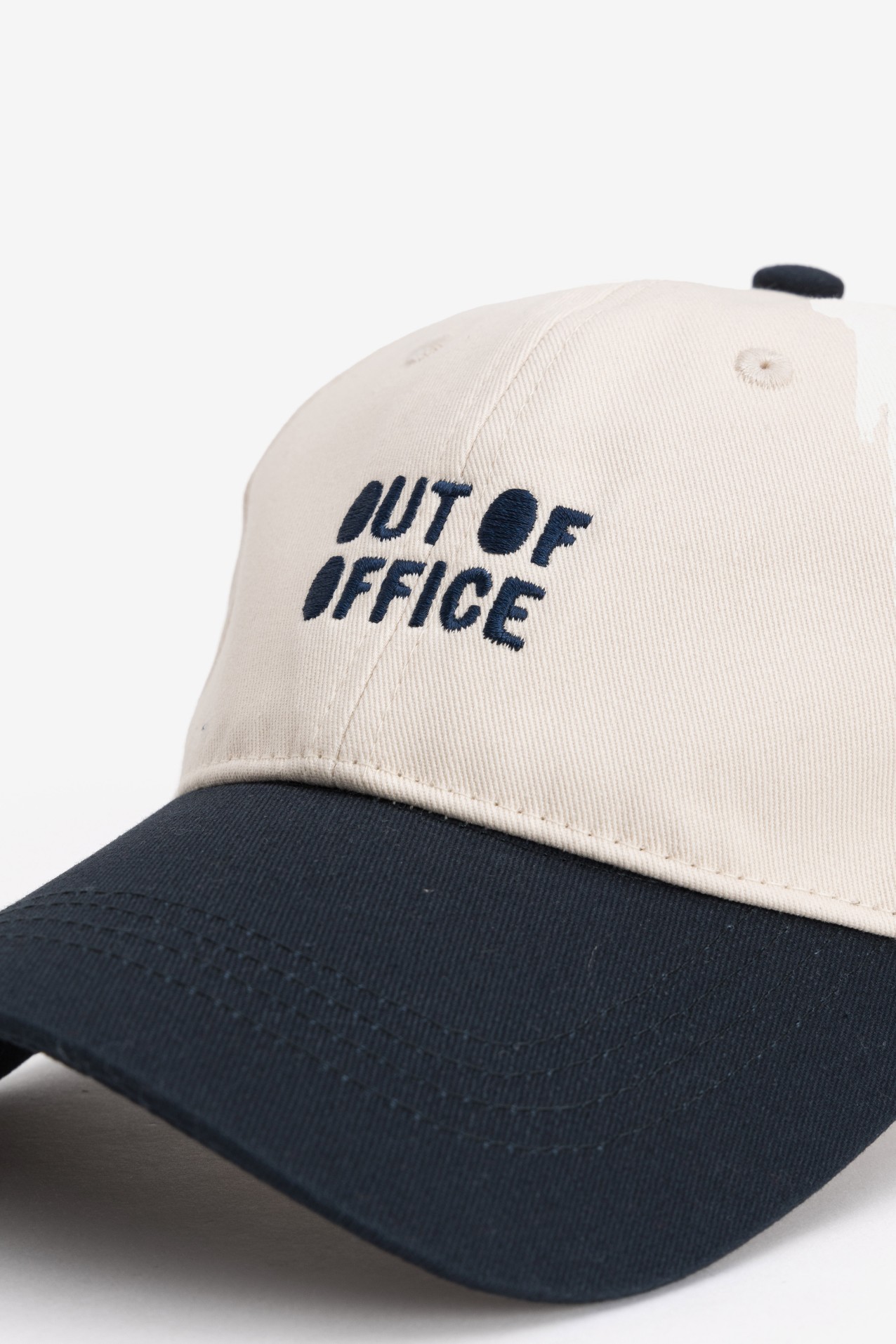 Beige Cap Blue Visor