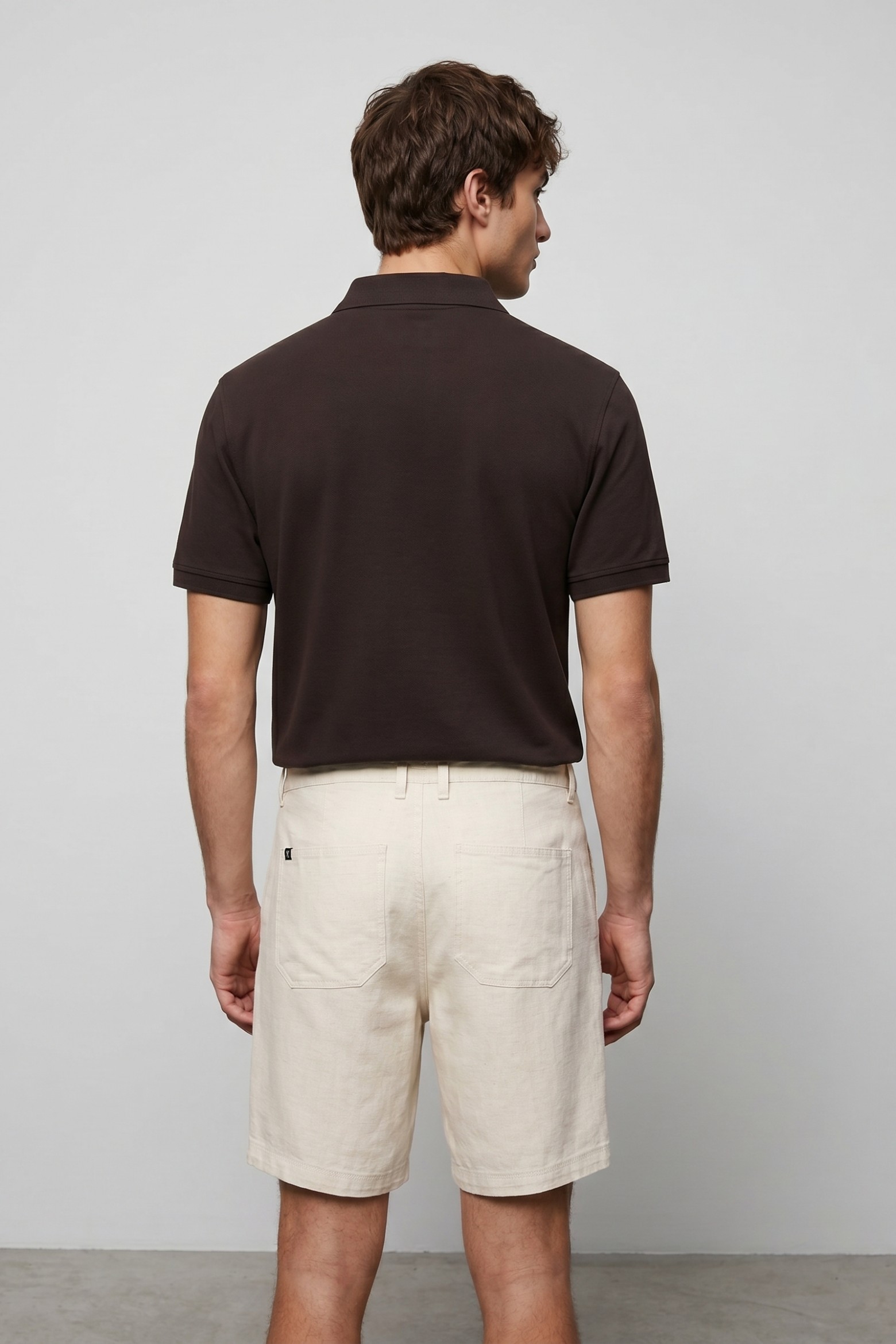 Brown polo with contrast details