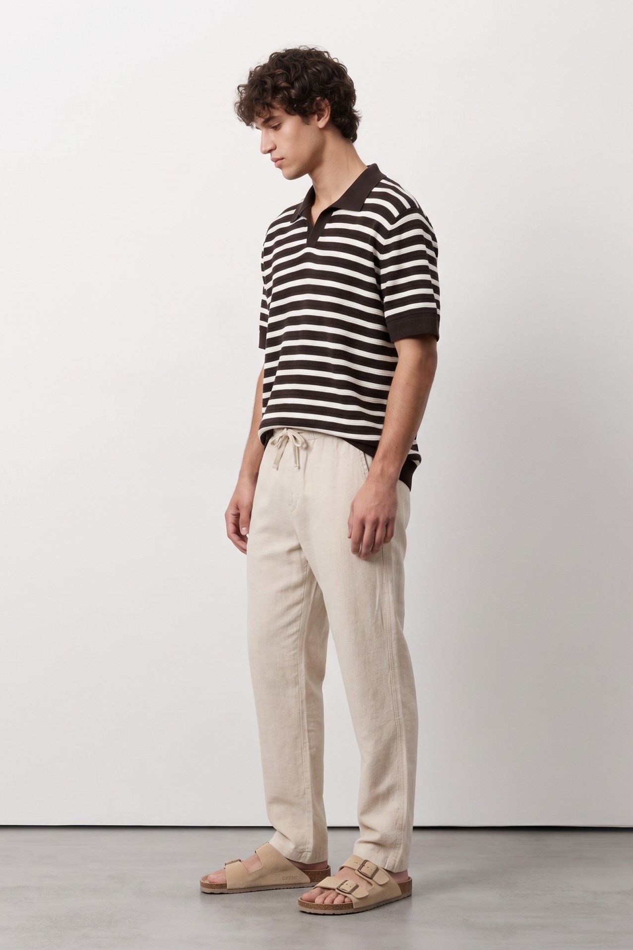 Polo marr�n a rayas