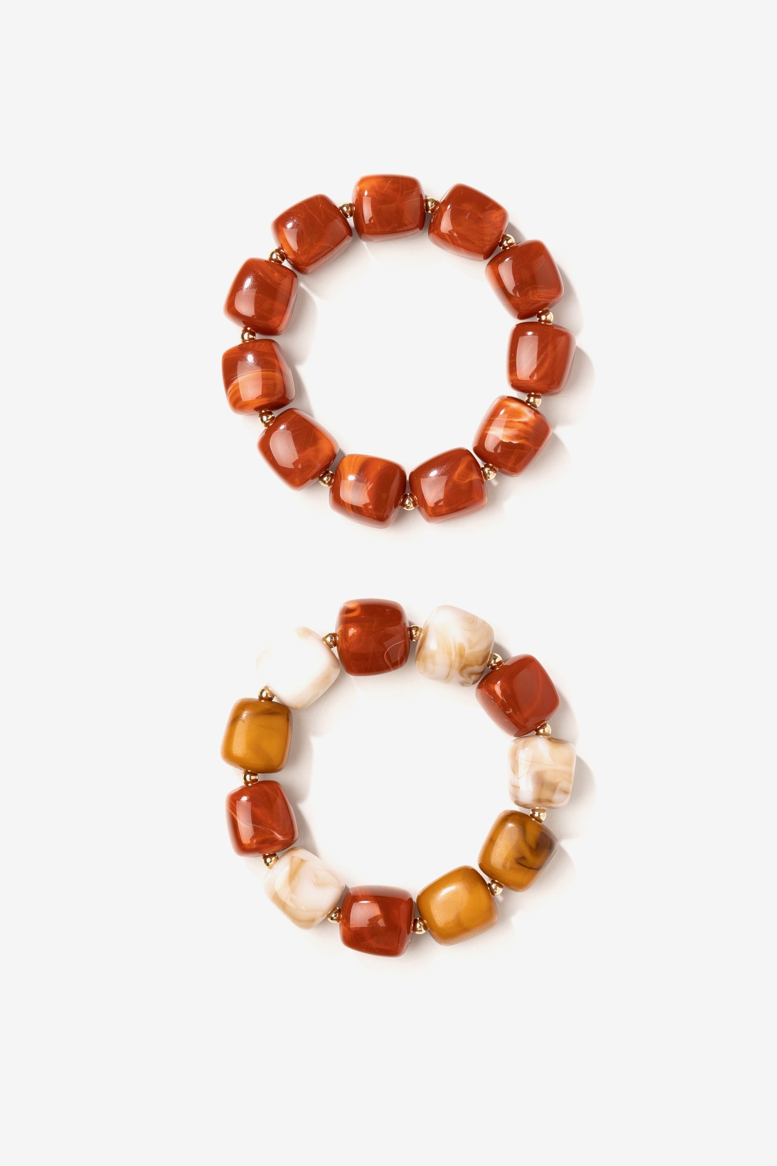 Chunky golden-toned bracelets
