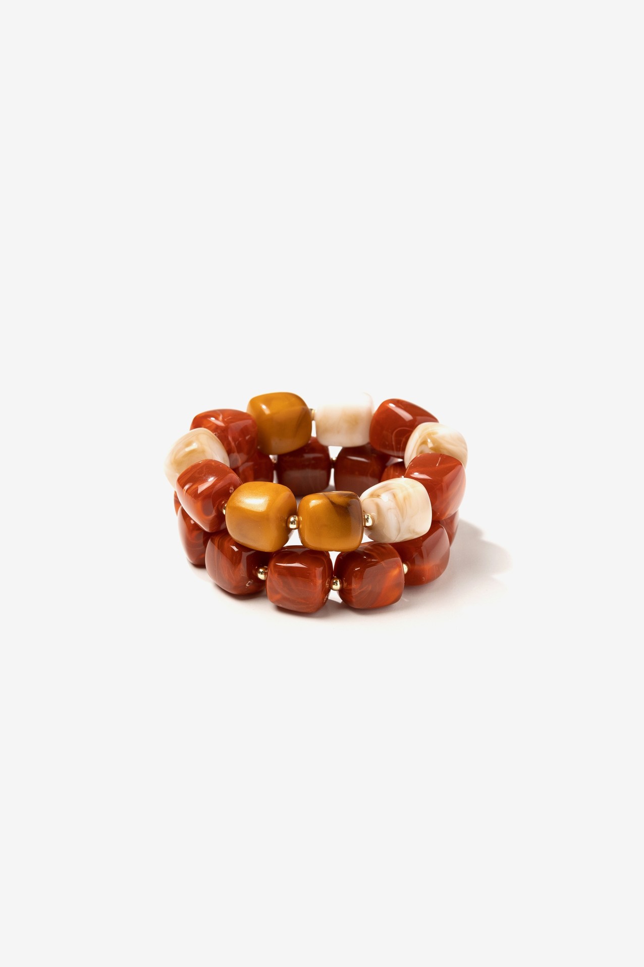 Chunky golden-toned bracelets
