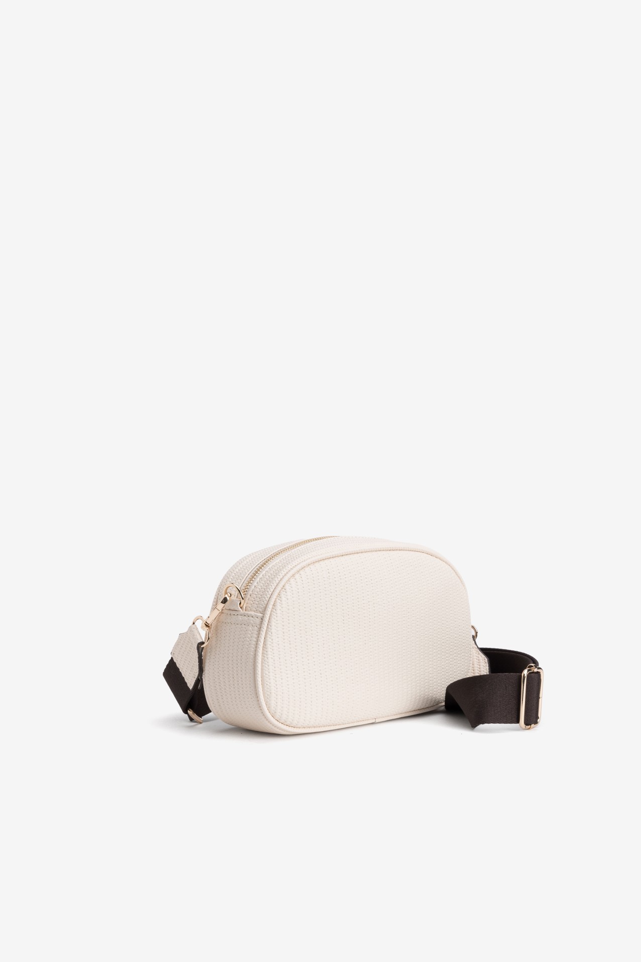 Cartera ovalada beige canelada