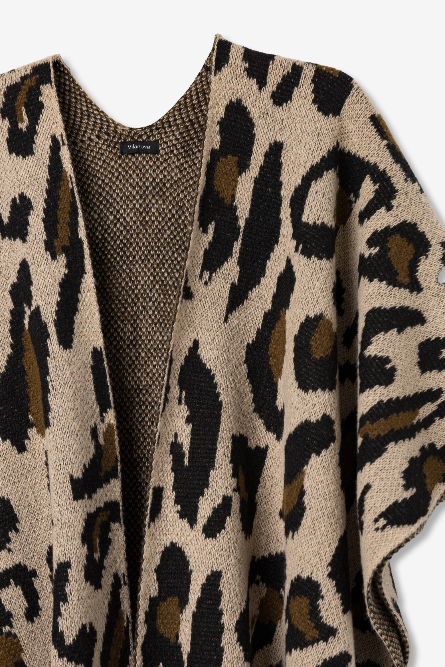Capa bege com padr�o animal